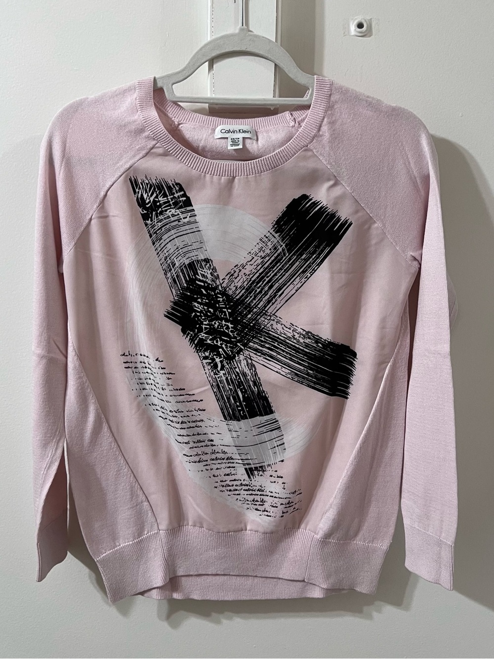 Calvin Klein Pale Pink Crewneck Sweater Fits an S.